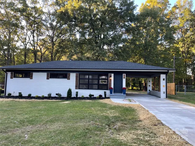 front view of a house with a big yard