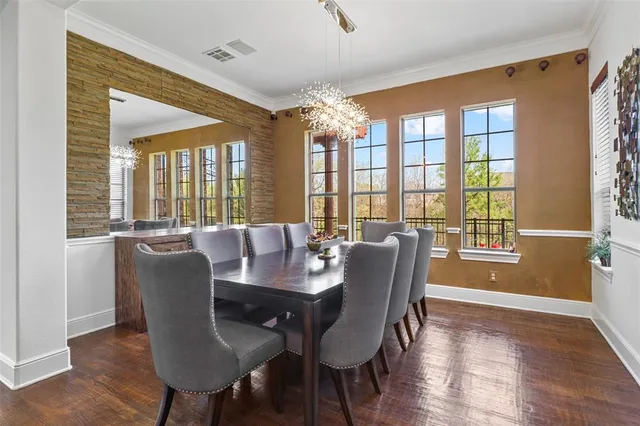 a view of a livingroom with furniture and wooden floor