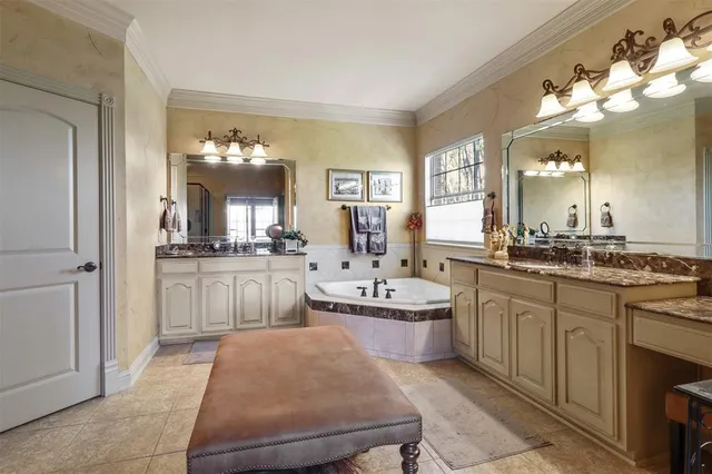 a bedroom with a bed and a night stand