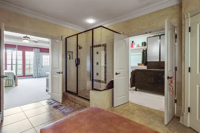 a large bathroom with a sink a large mirror and a vanity