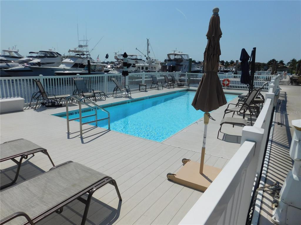 102 Riviera Dunes Way, Unit S7 Palmetto, FL 34221 - Photo 13 of 56 a view of a terrace with seating area and furniture