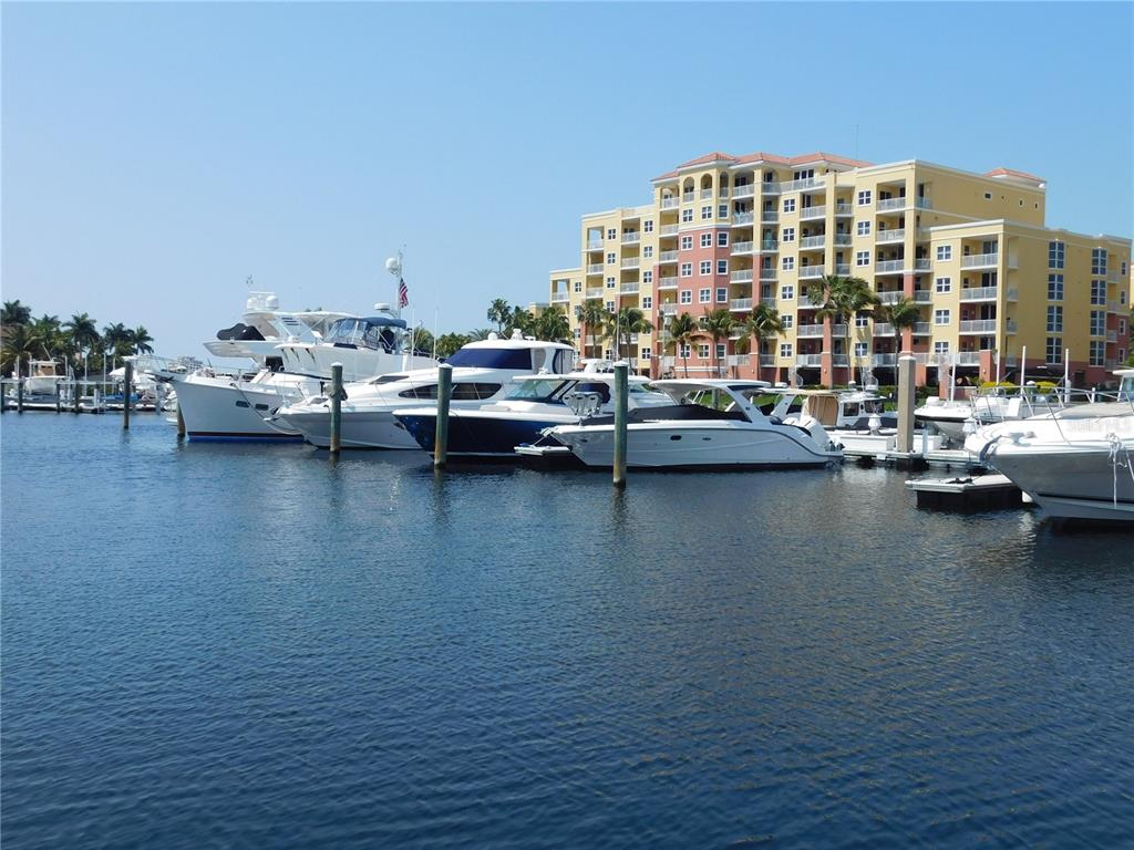 102 Riviera Dunes Way, Unit S7 Palmetto, FL 34221 - Photo 38 of 56 a view of ocean with boats and trees
