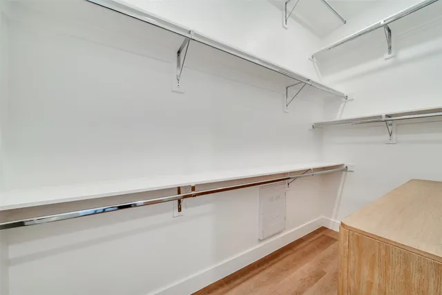 a view of a room with racks on the wall