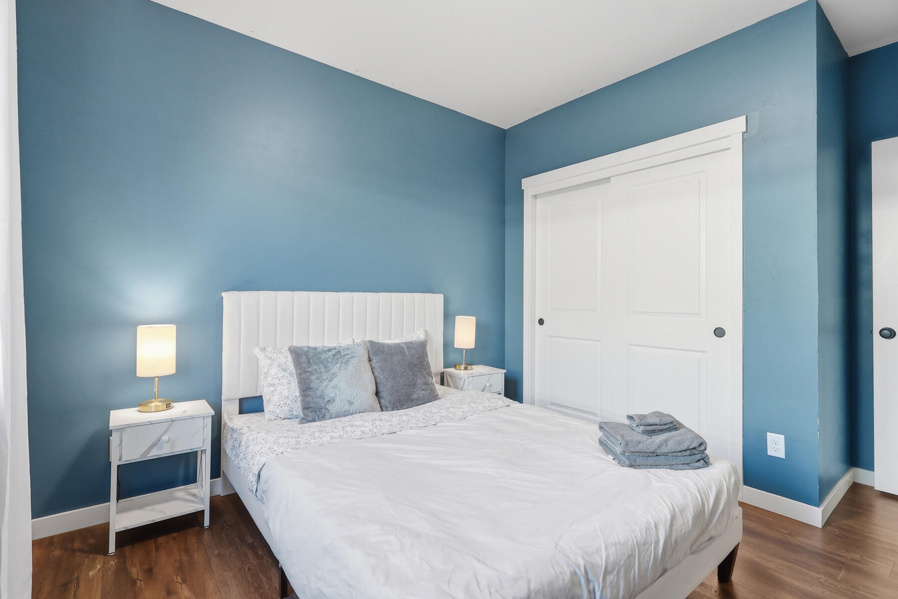 16455 Bassett Road La Pine, OR 97739 - Photo 18 of 44 a bedroom with a bed and wooden floor
