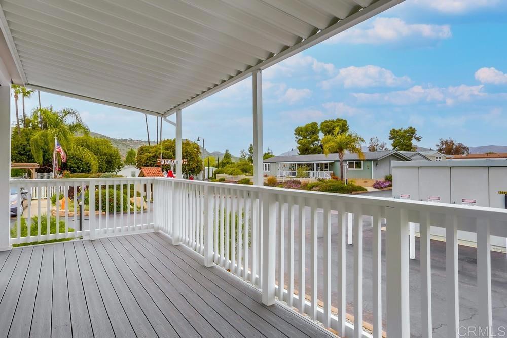 4650 Dulin Road, Unit 45 Fallbrook, CA 92003 - Photo 3 of 42 a view of a balcony with wooden floor