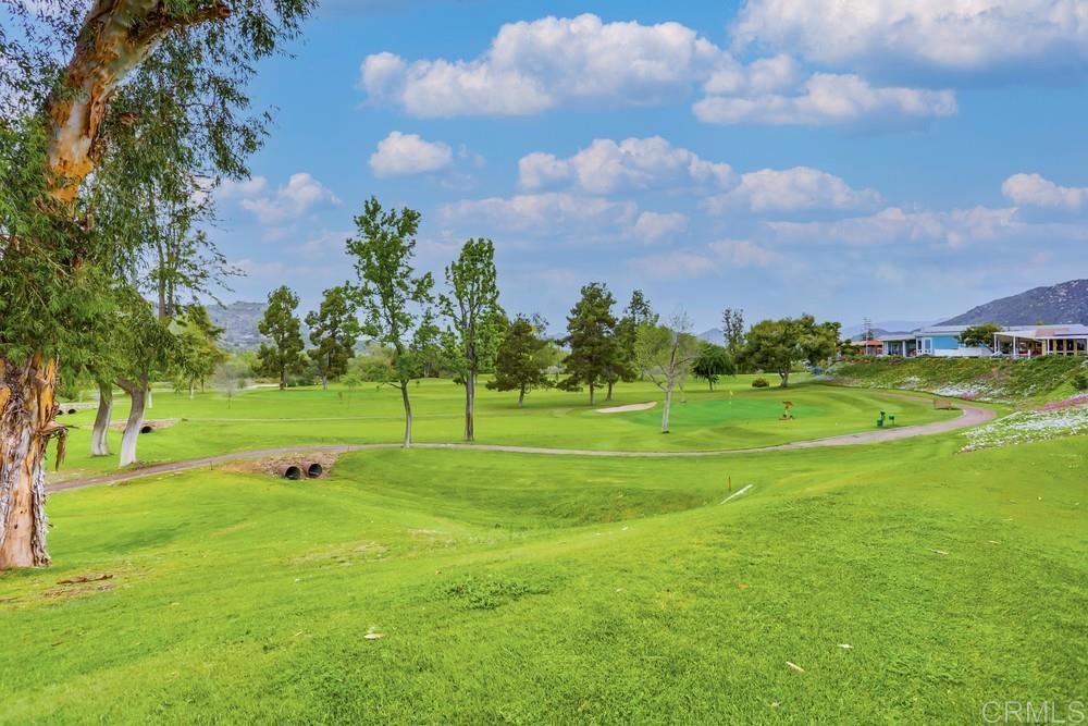 4650 Dulin Road, Unit 45 Fallbrook, CA 92003 - Photo 39 of 42 a view of a golf course with a lake