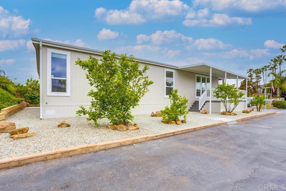 4650 Dulin Road, Unit 45 Fallbrook, CA 92003 - Photo 4 of 42 a front view of a house with garden