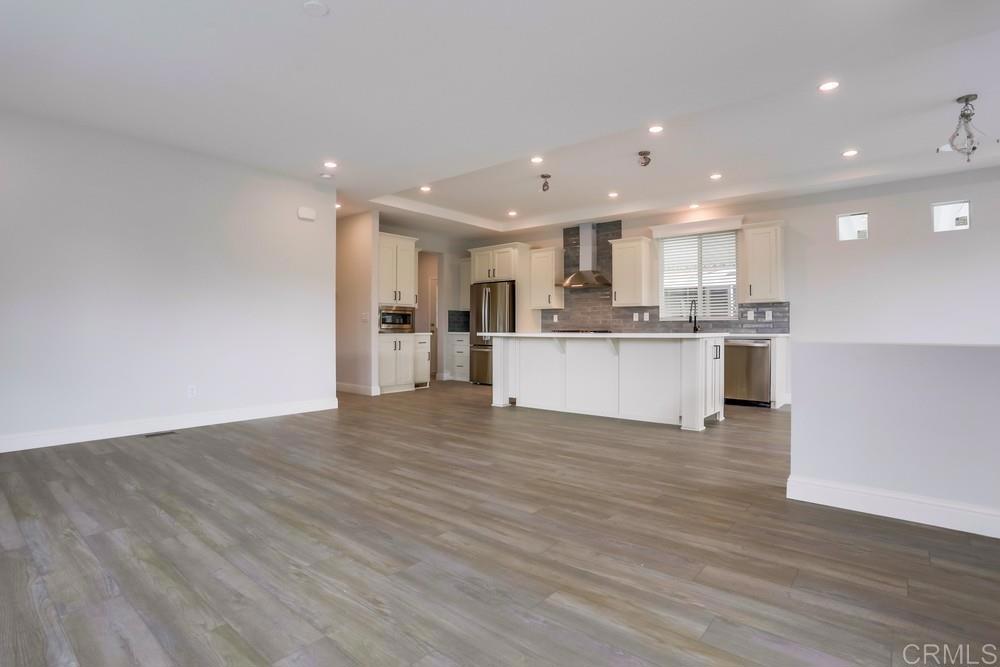 4650 Dulin Road, Unit 45 Fallbrook, CA 92003 - Photo 7 of 42 a view of kitchen with wooden floor