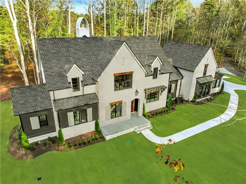 14245 South Thompson Road Milton, GA 30004 - Photo 1 of 1 front view of a house with a yard