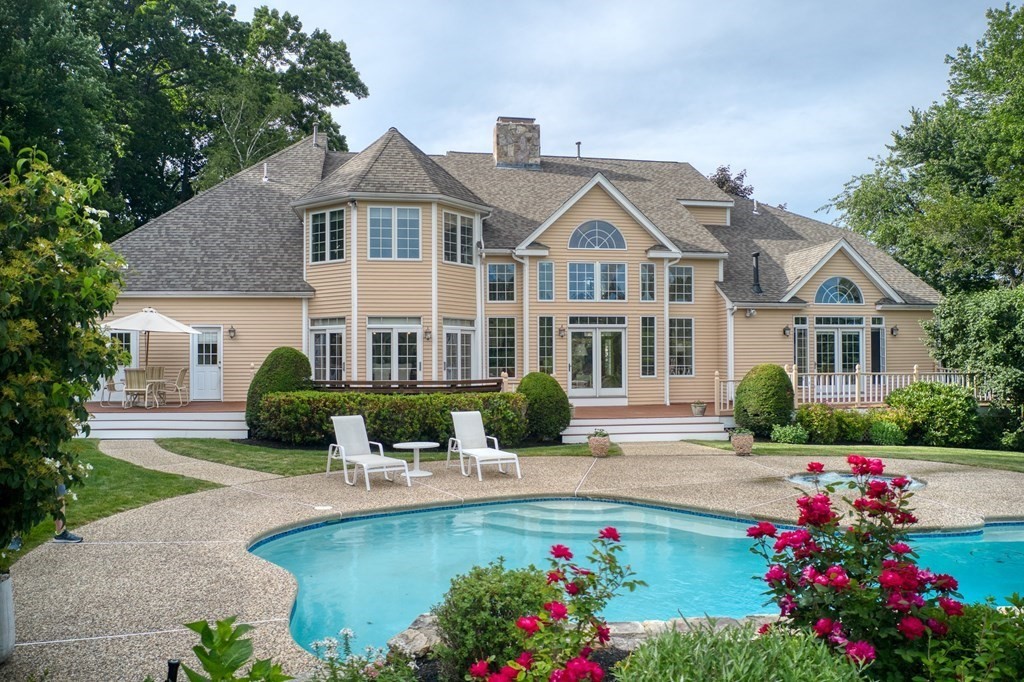 9 Ruggiero Way Andover, MA 01810 - Photo 2 of 9 a front view of a house with a yard and fountain