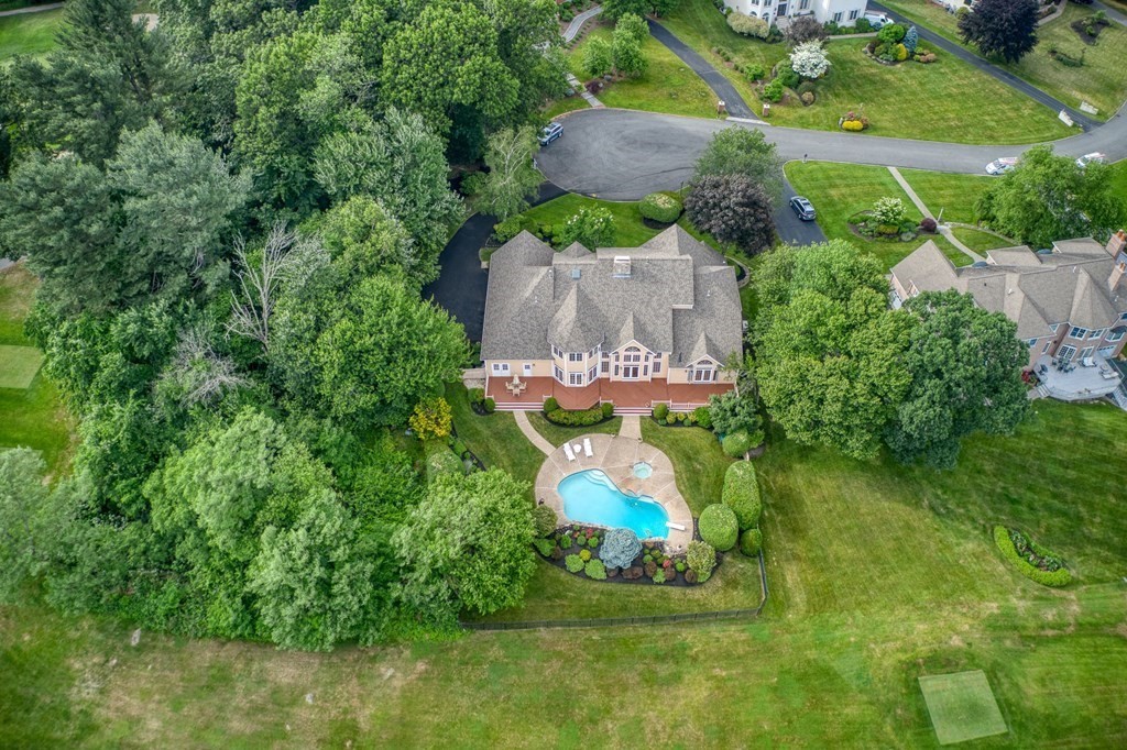 9 Ruggiero Way Andover, MA 01810 - Photo 3 of 9 an aerial view of a house with a garden and swimming pool