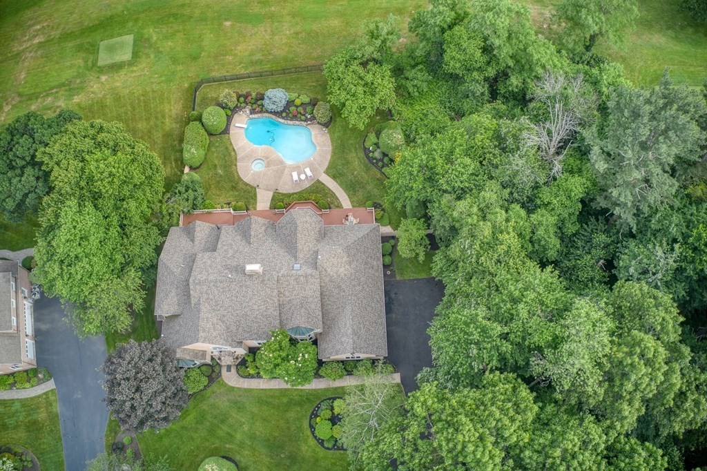 9 Ruggiero Way Andover, MA 01810 - Photo 5 of 9 an aerial view of a house with a yard and trees all around
