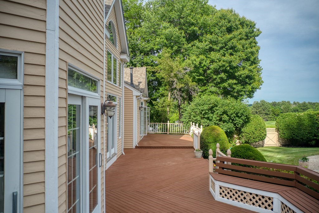 9 Ruggiero Way Andover, MA 01810 - Photo 9 of 9 a view of a backyard with sitting area and garden