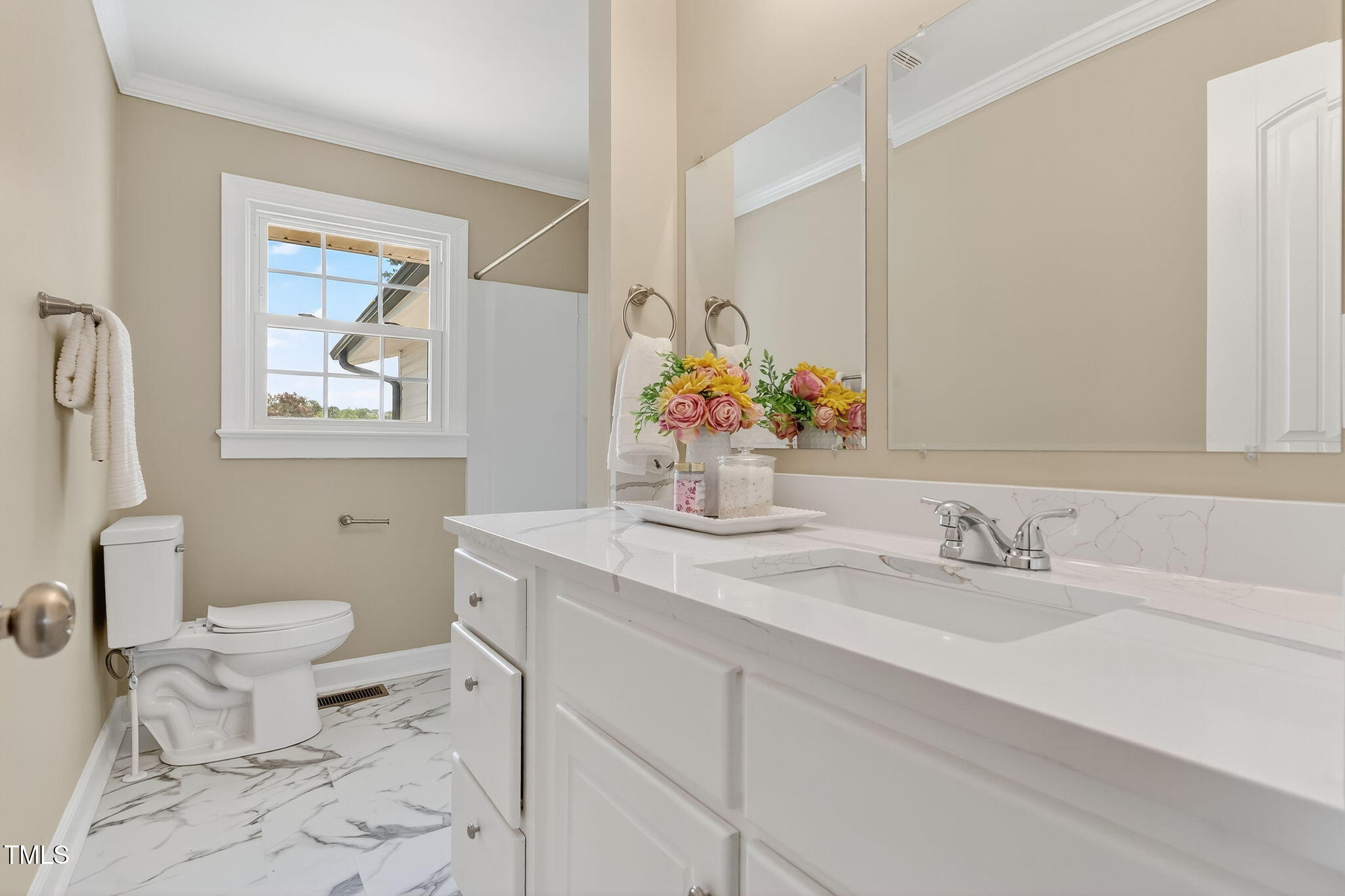 6715 Princeton Kenly Road Princeton, NC 27569 - Photo 16 of 35 a bathroom with a sink toilet and a mirror