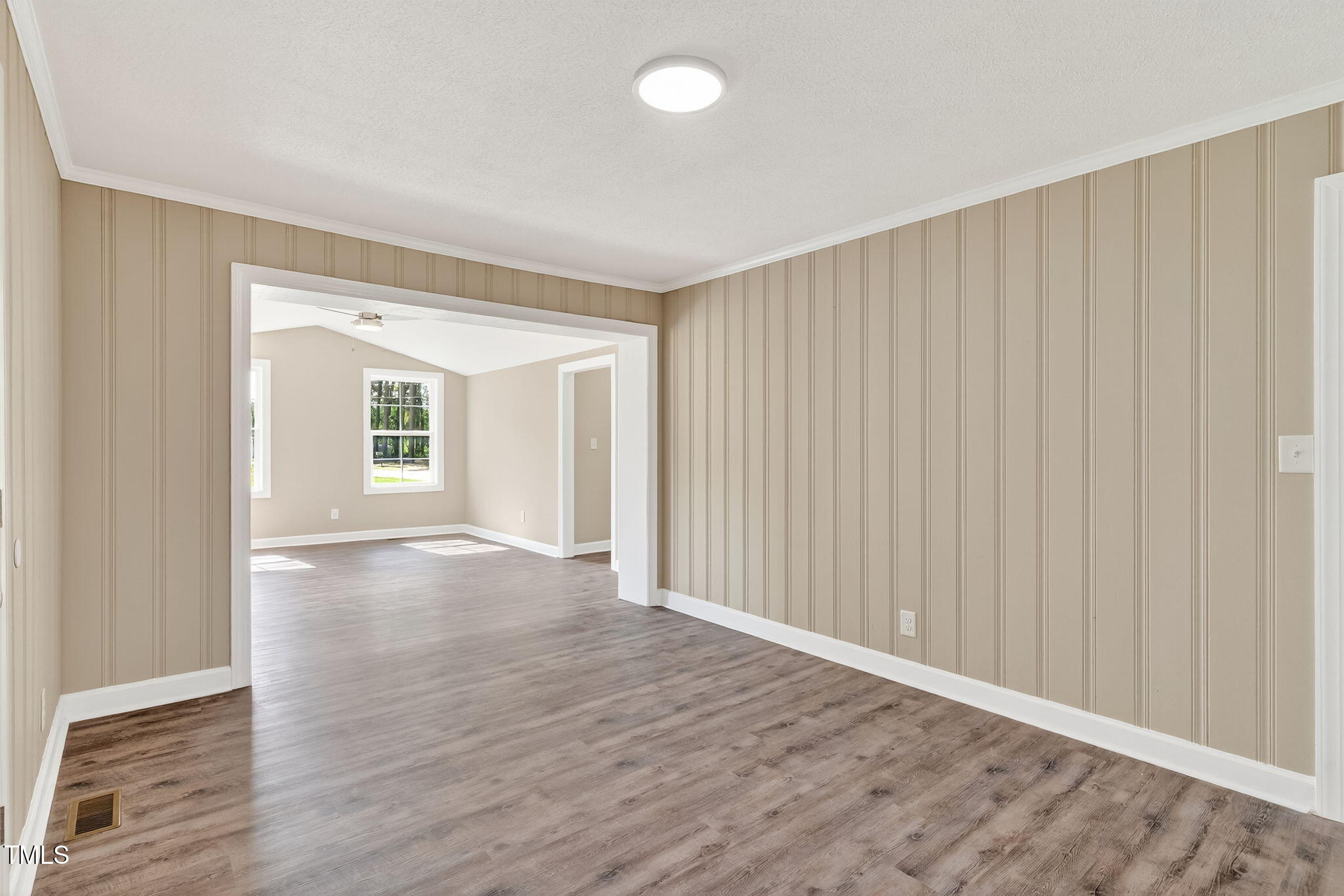 6715 Princeton Kenly Road Princeton, NC 27569 - Photo 17 of 35 wooden floor in an empty room with a window