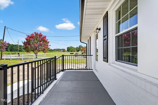 a view of a house with a porch