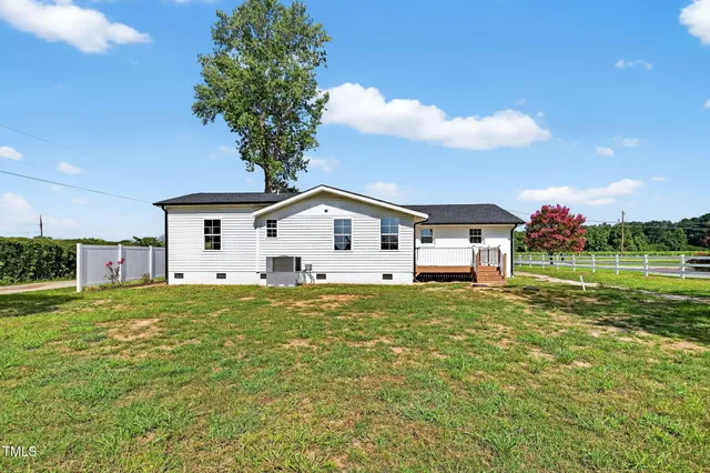 a house view with a garden space