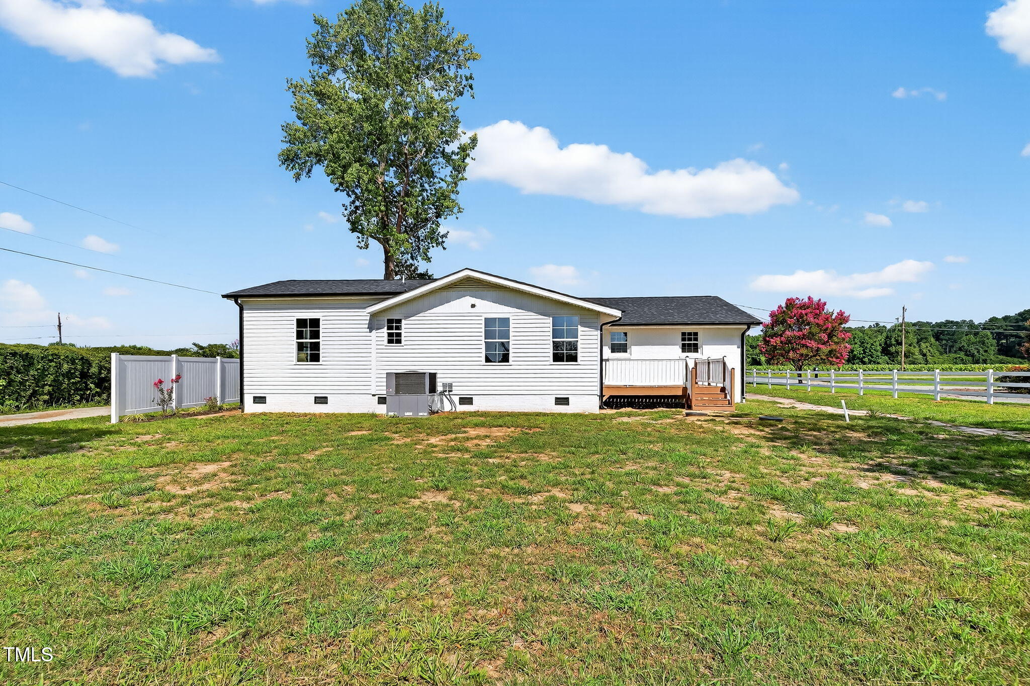 6715 Princeton Kenly Road Princeton, NC 27569 - Photo 33 of 35 a house view with a garden space