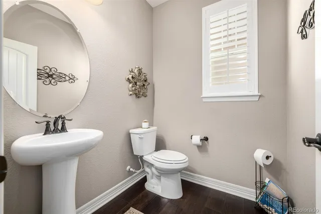 a living room with furniture window and flat screen tv