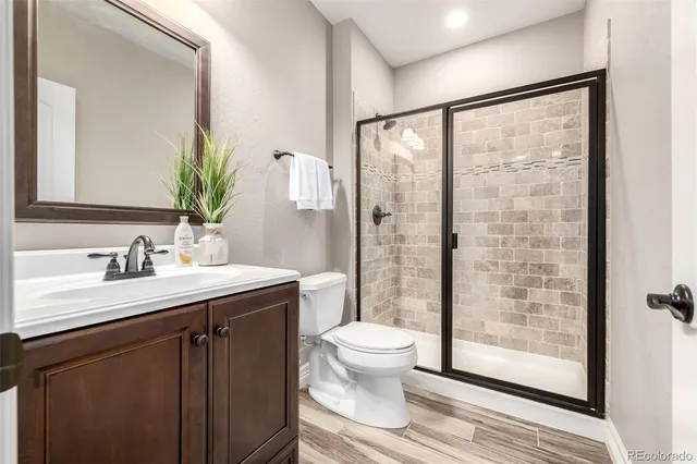 a spacious bedroom with a bed and window