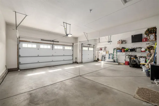 a aerial view of a house with a yard