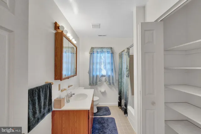 a picture of a room with a white wall and door