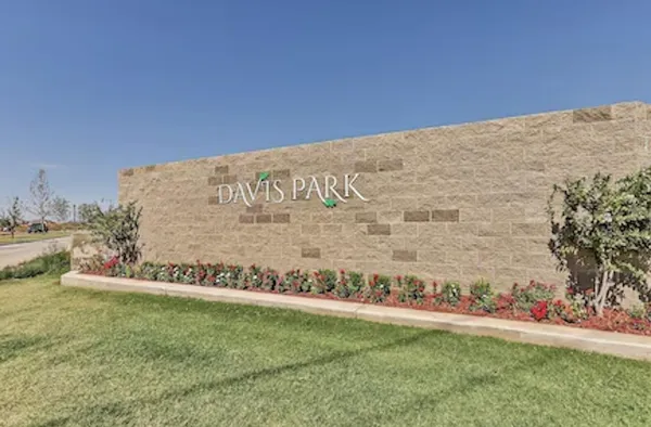 a view of a field with a big yard