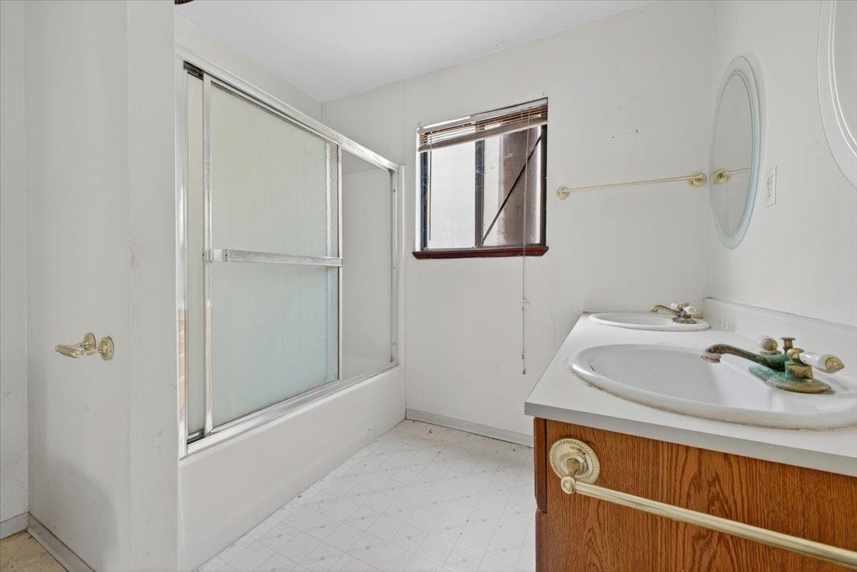 46404 Arroyo Seco Road Greenfield, CA 93927 - Photo 14 of 53 a bathroom with a sink and vanity
