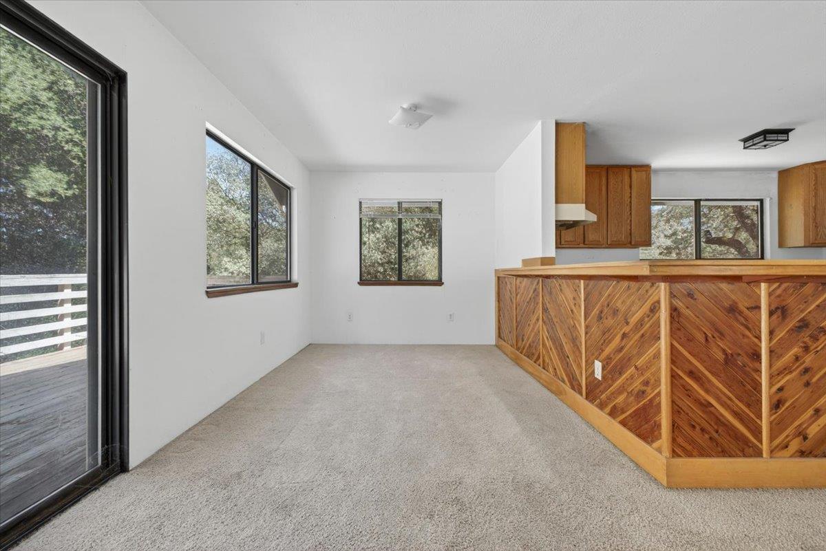 46404 Arroyo Seco Road Greenfield, CA 93927 - Photo 21 of 53 a view of a hallway with windows