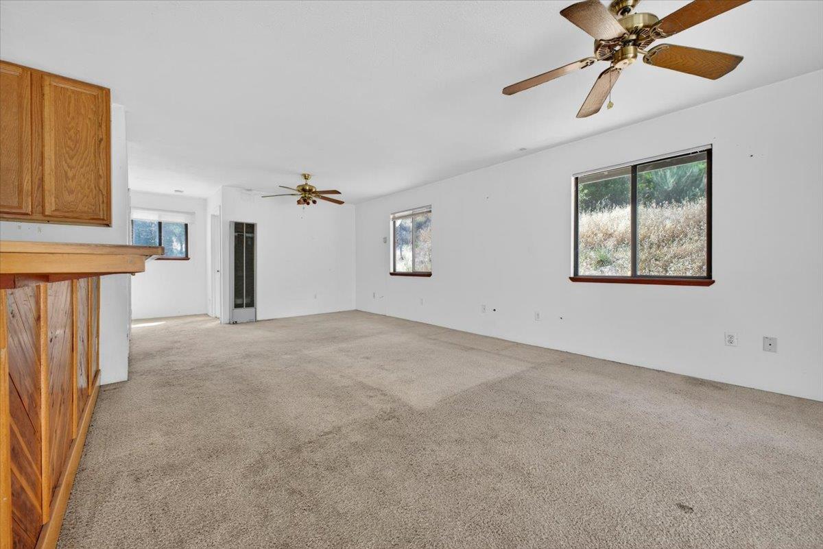 46404 Arroyo Seco Road Greenfield, CA 93927 - Photo 24 of 53 an empty room with windows and fan