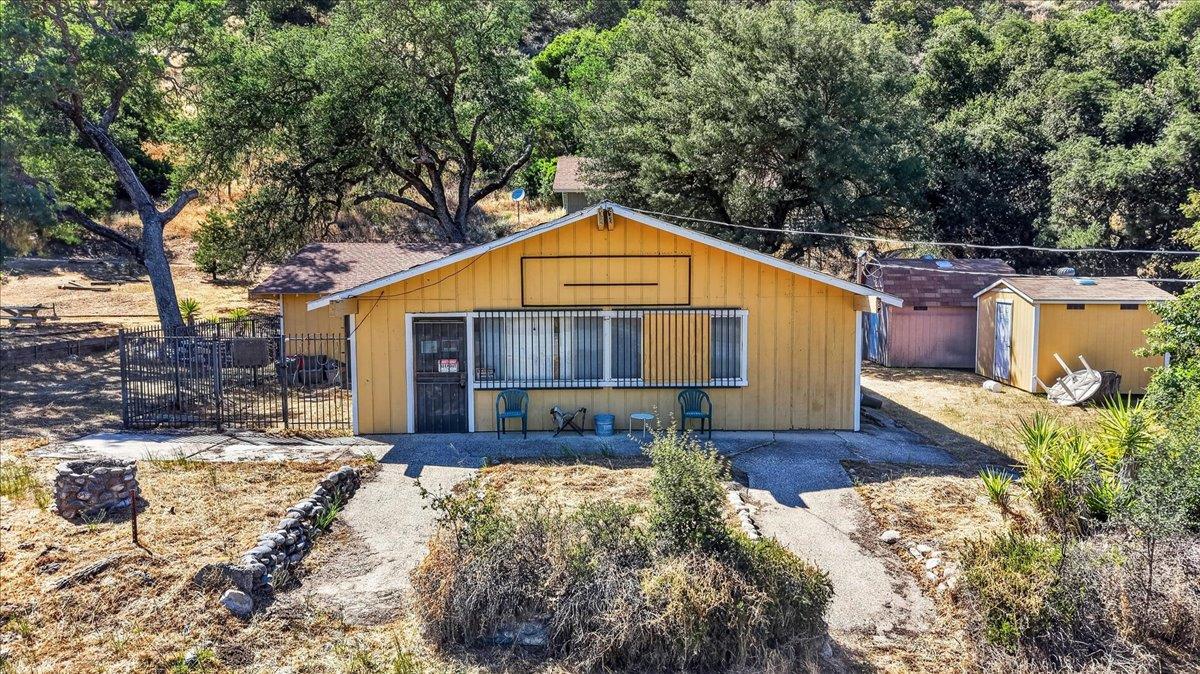 46404 Arroyo Seco Road Greenfield, CA 93927 - Photo 39 of 53 a front view of a house with a yard covered with snow and trees