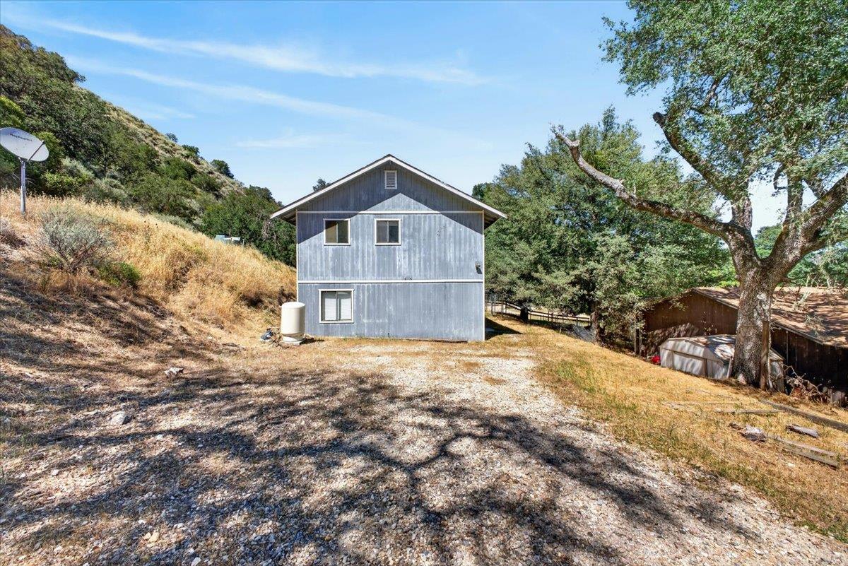 46404 Arroyo Seco Road Greenfield, CA 93927 - Photo 4 of 53 a front view of a house with a yard and large tree