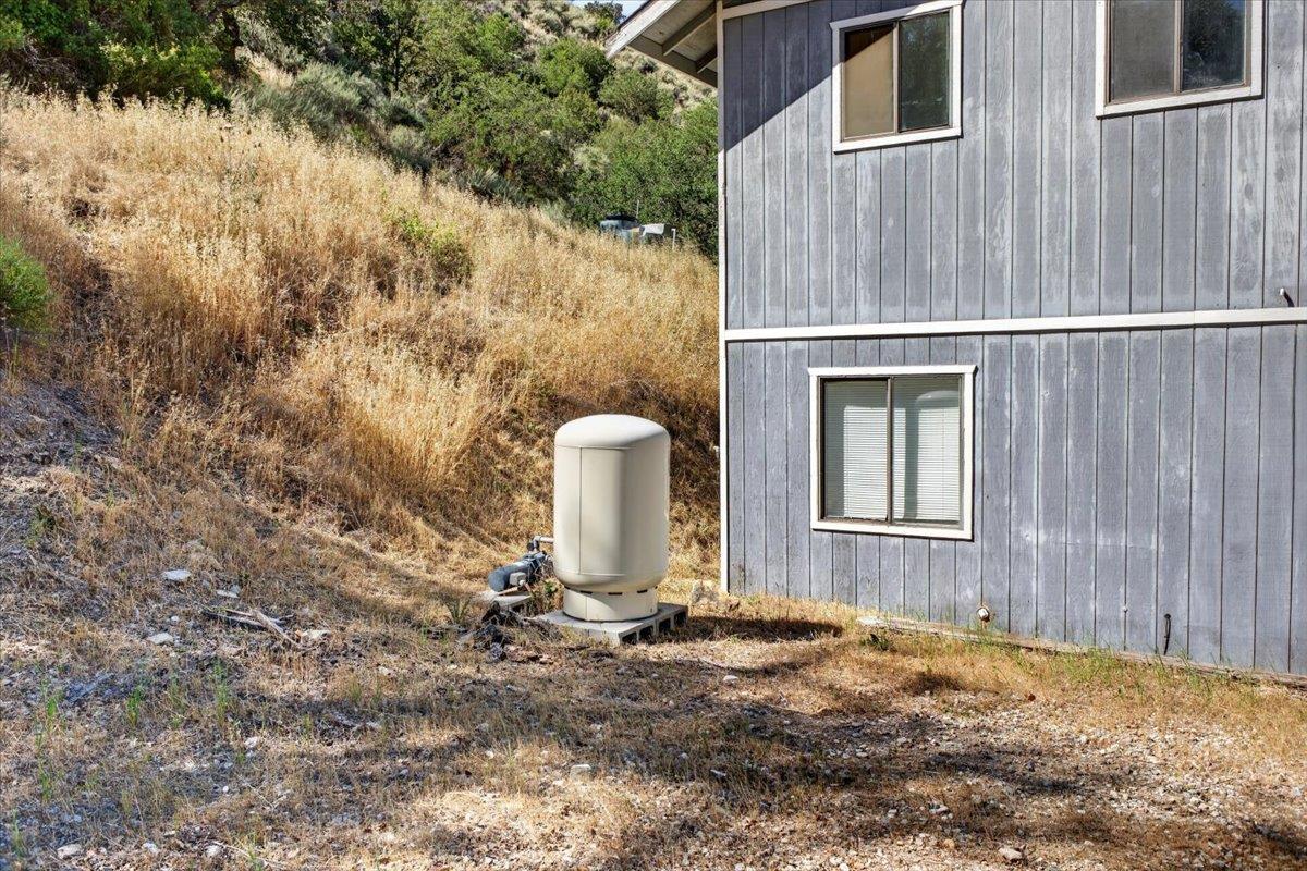 46404 Arroyo Seco Road Greenfield, CA 93927 - Photo 6 of 53 a front view of a house with a yard