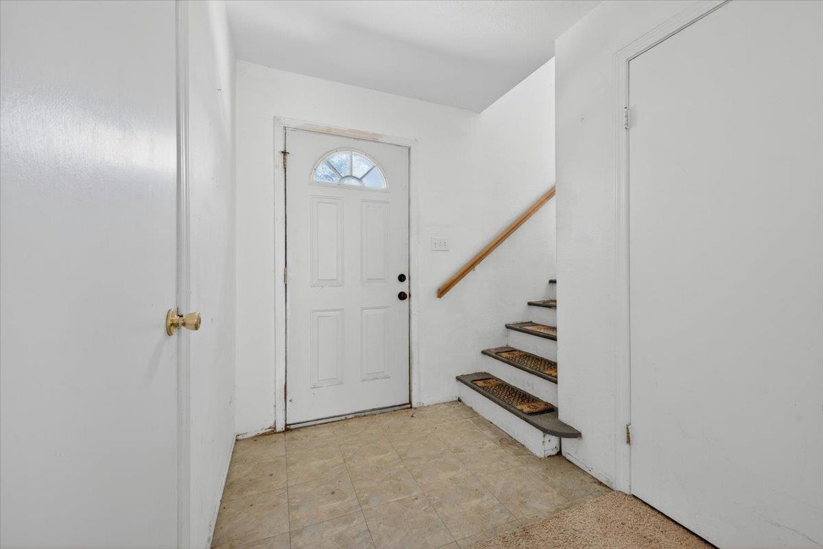 46404 Arroyo Seco Road Greenfield, CA 93927 - Photo 8 of 53 a view of an empty room with stairs