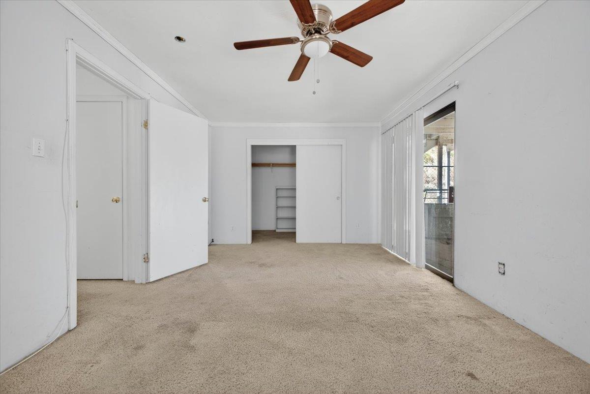46404 Arroyo Seco Road Greenfield, CA 93927 - Photo 10 of 53 an empty room with closet and windows