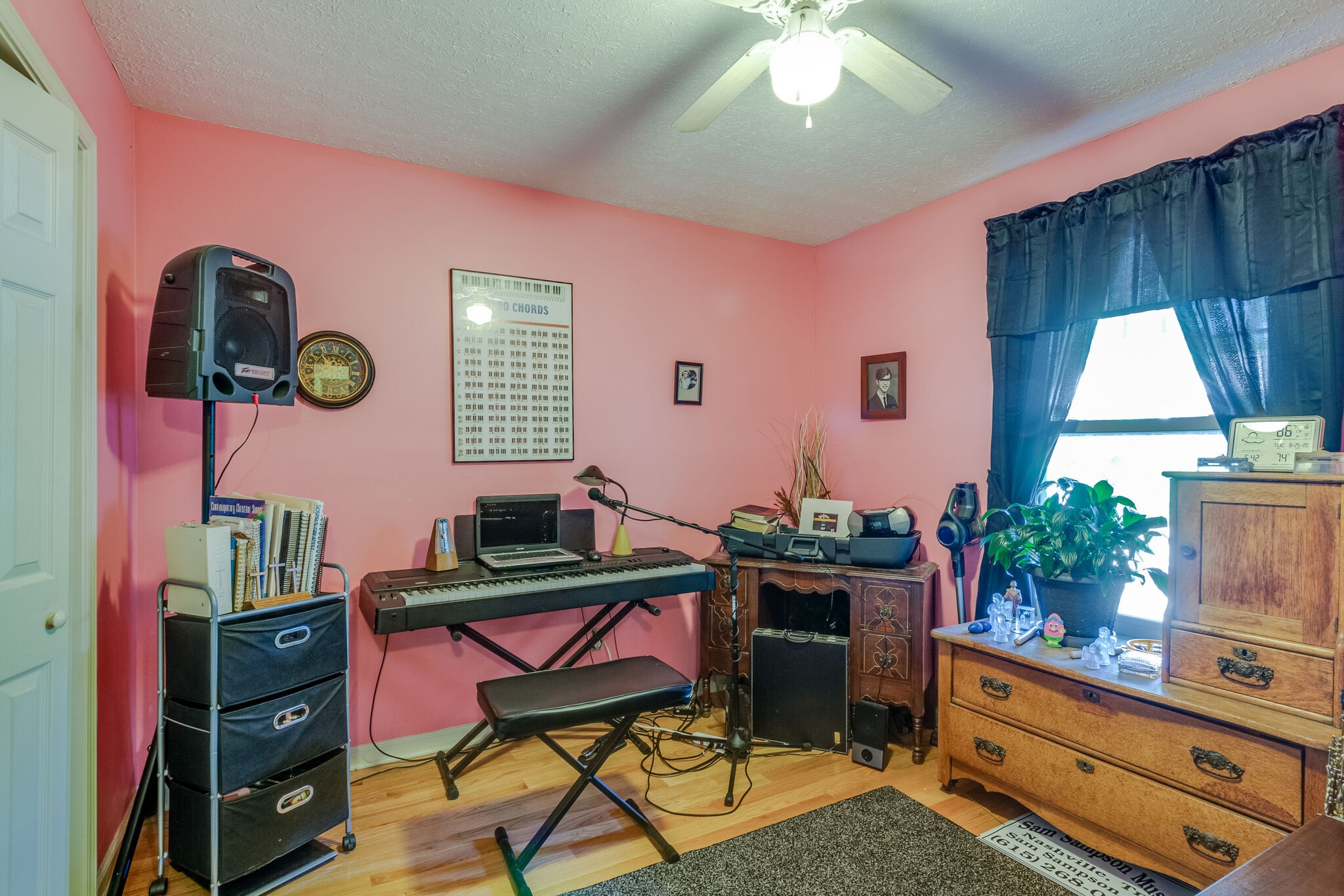 1216 Idlewild Place Madison, TN 37115 - Photo 15 of 24 a room with furniture a chandelier and a window