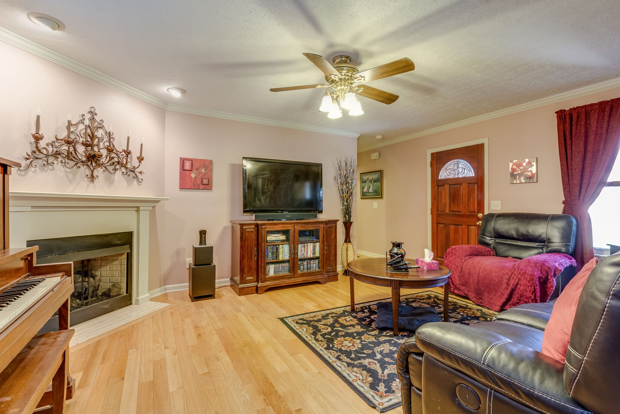 1216 Idlewild Place Madison, TN 37115 - Photo 6 of 24 a living room with furniture and a flat screen tv