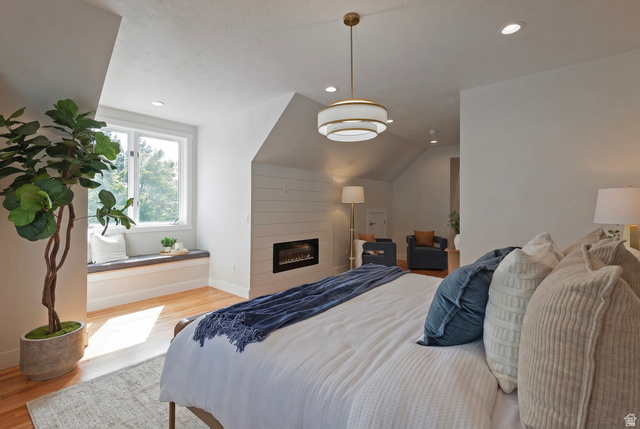 16 Gatehouse Lane Sandy, UT 84092 - Photo 24 of 73 Huge primary En suite bedroom featuring vaulted ceiling, fireplace and tons of natural light.