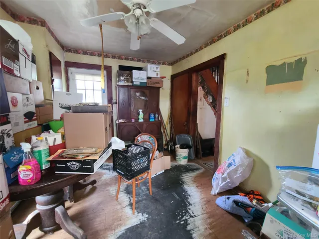 a room with furniture toys and a window