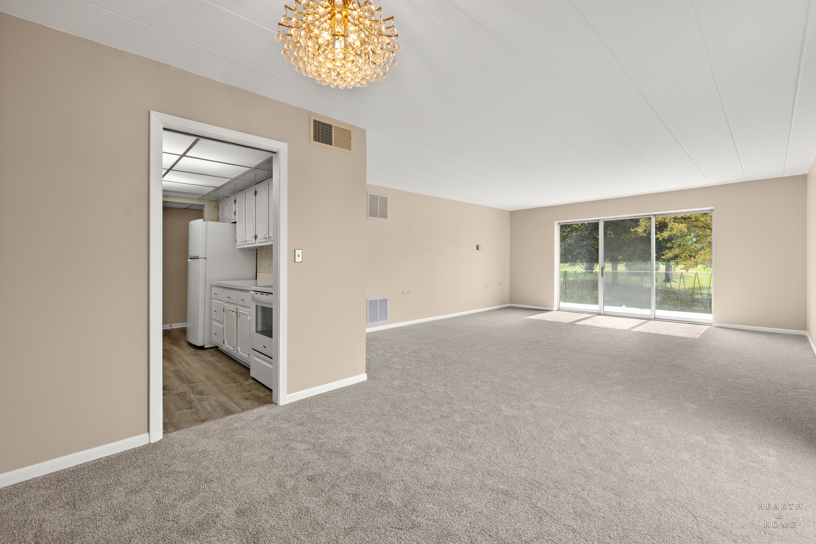 5300 Walnut Avenue, Unit 12B Downers Grove, IL 60515 - Photo 12 of 30 an empty room with a bathroom and a sink