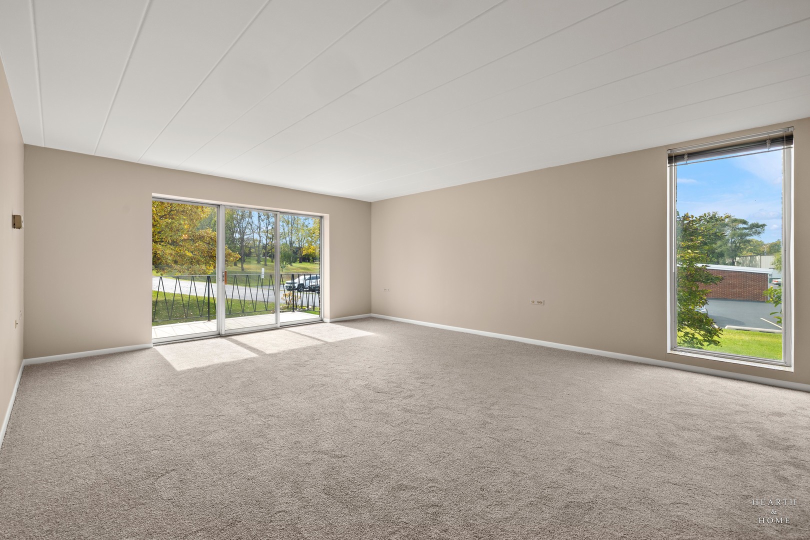 5300 Walnut Avenue, Unit 12B Downers Grove, IL 60515 - Photo 9 of 30 a view of an empty room with a window