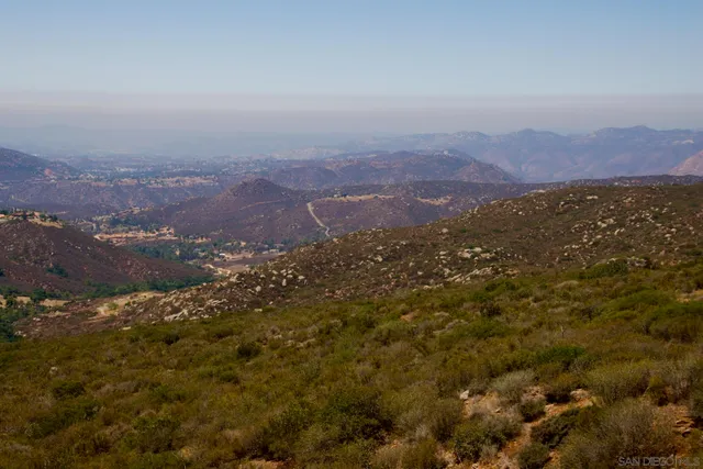 a picture of a bathroom with a shower