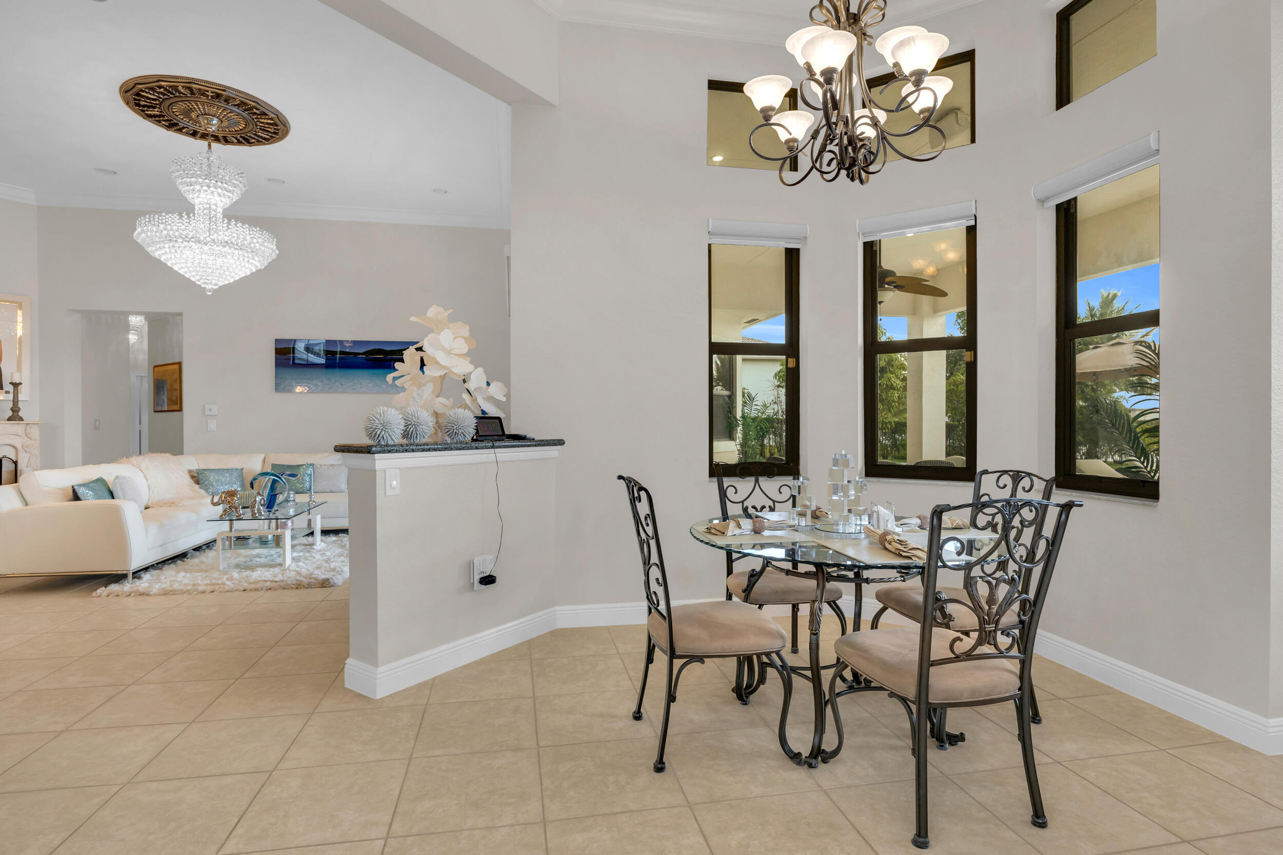 15182 Southwest 35th Street Davie, FL 33331 - Photo 15 of 53 a view of a dining room with furniture and chandelier