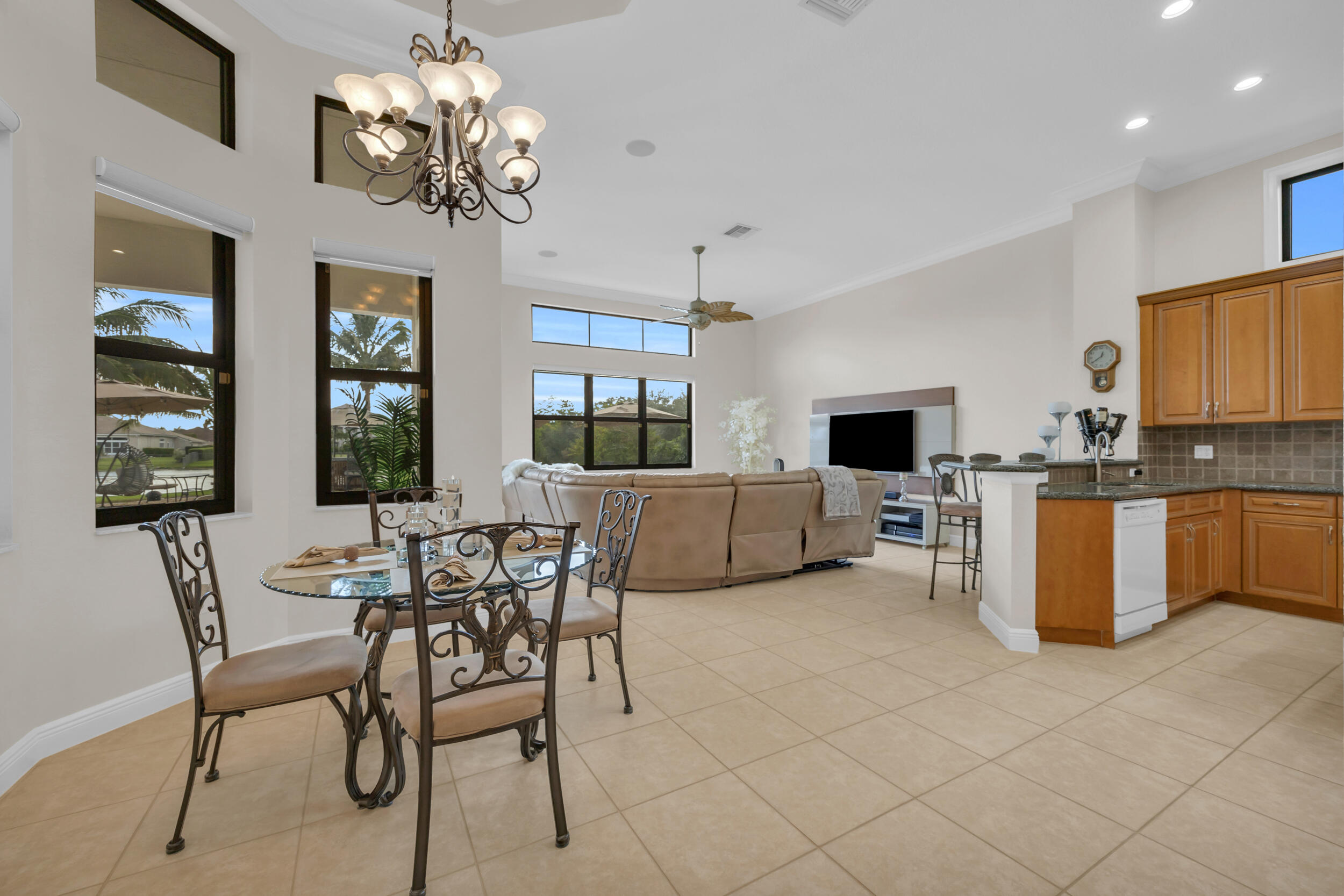 15182 Southwest 35th Street Davie, FL 33331 - Photo 16 of 53 a view of a dining room with furniture and chandelier