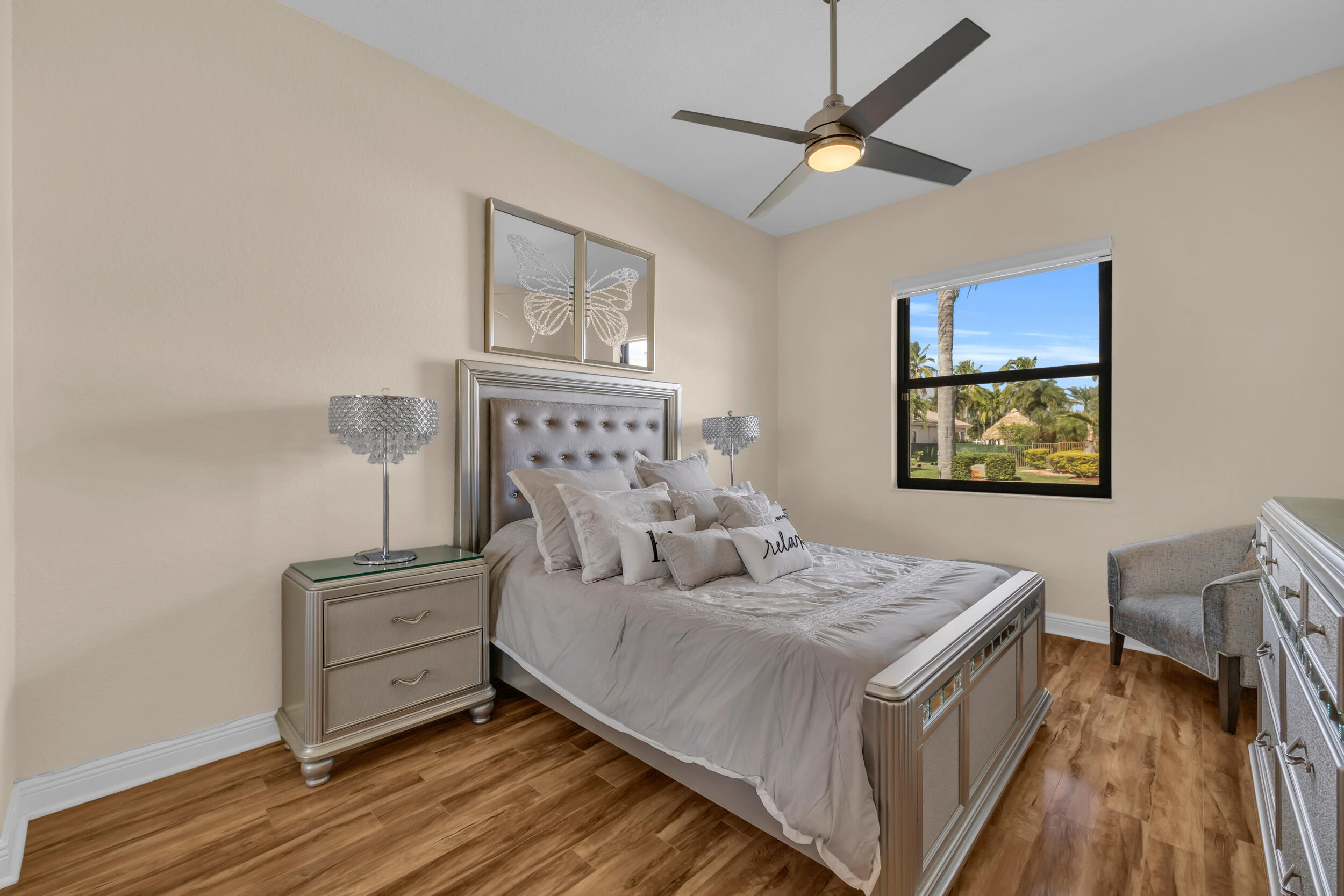 15182 Southwest 35th Street Davie, FL 33331 - Photo 31 of 53 a bedroom with a bed and a chandelier