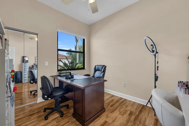 a bedroom with a bed and a table