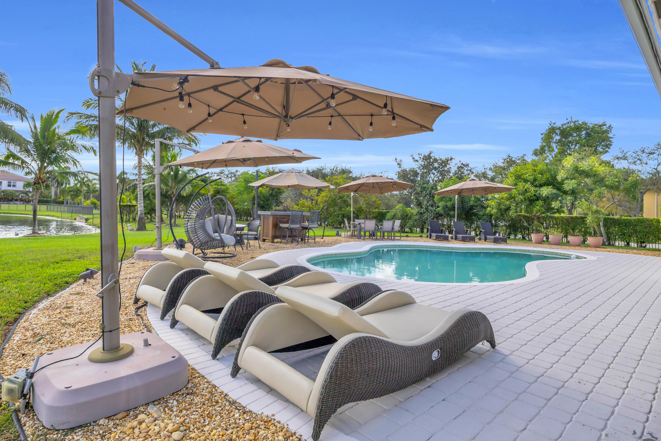 15182 Southwest 35th Street Davie, FL 33331 - Photo 40 of 53 a view of a swimming pool with a patio