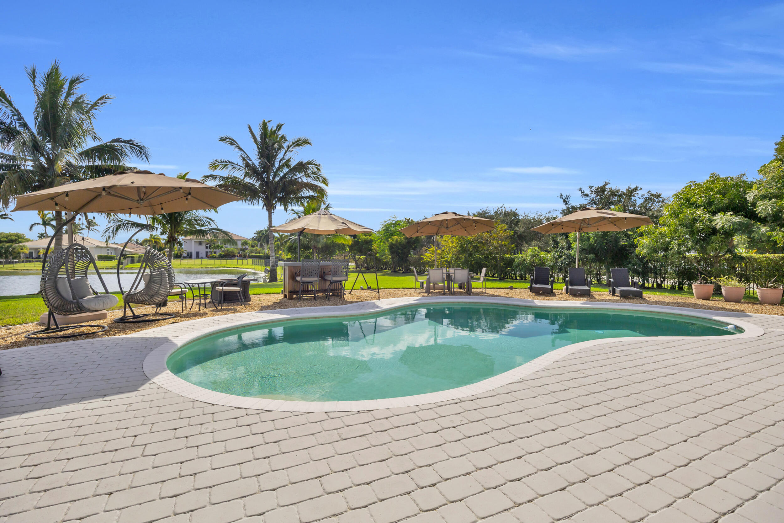 15182 Southwest 35th Street Davie, FL 33331 - Photo 41 of 53 a view of swimming pool with outdoor seating and yard in back