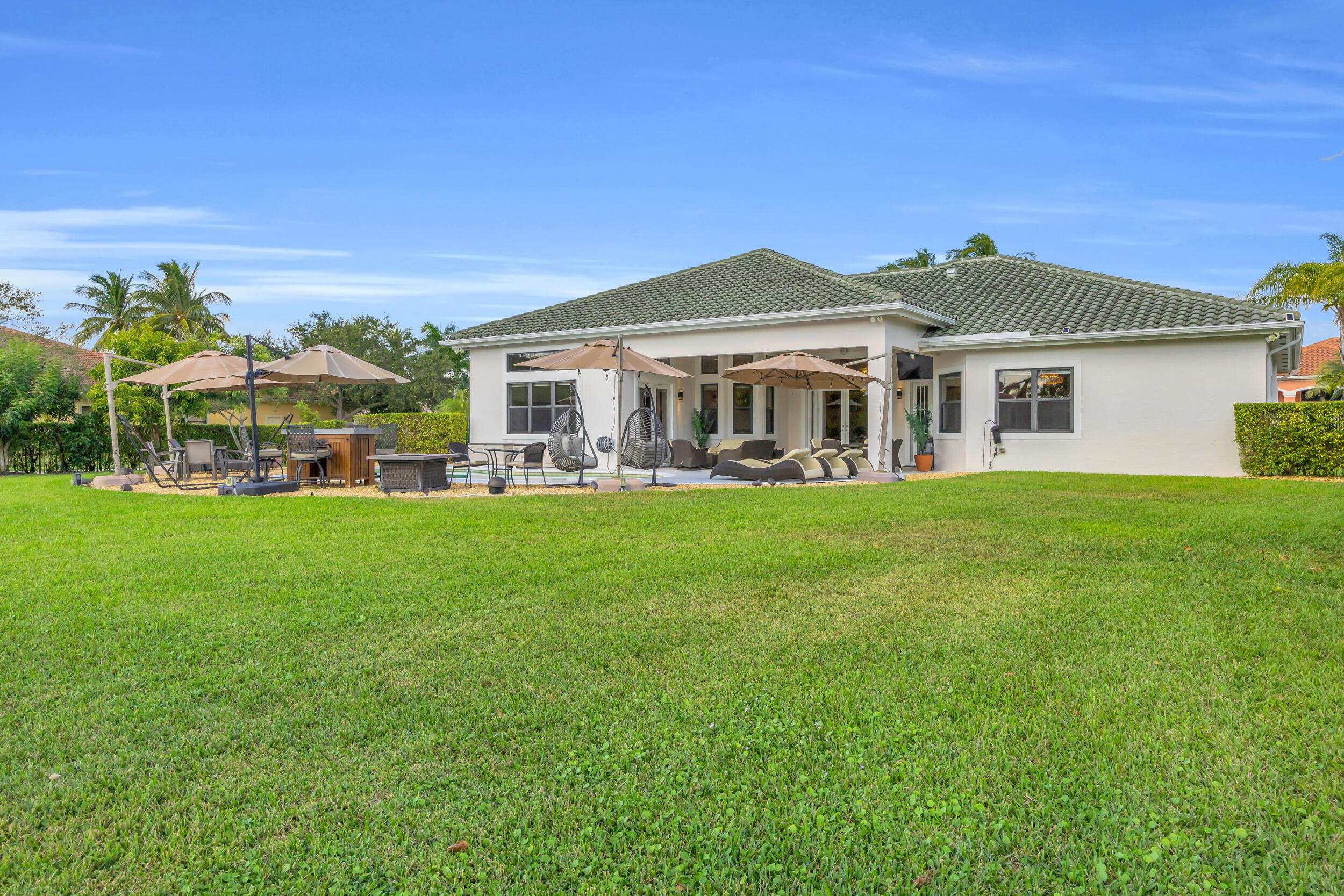 15182 Southwest 35th Street Davie, FL 33331 - Photo 44 of 53 a front view of a house with garden