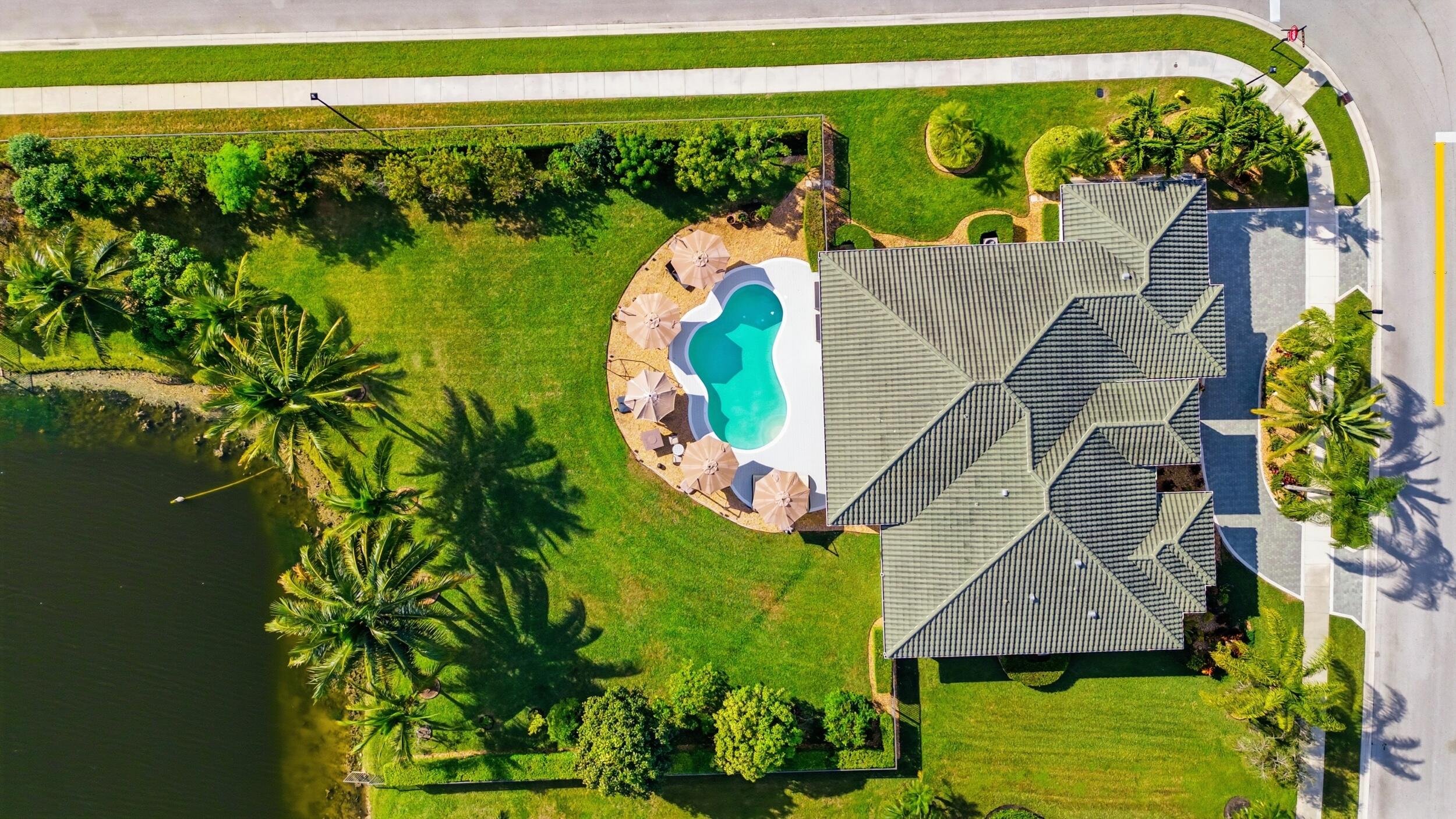 15182 Southwest 35th Street Davie, FL 33331 - Photo 47 of 53 a view of swimming pool with a garden